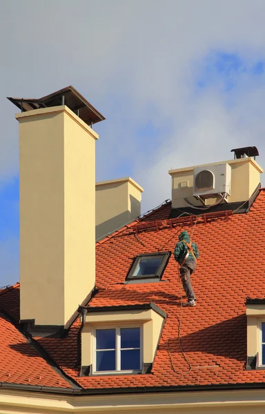 Chimney sweep cleaning a fireplace in New Jersey
